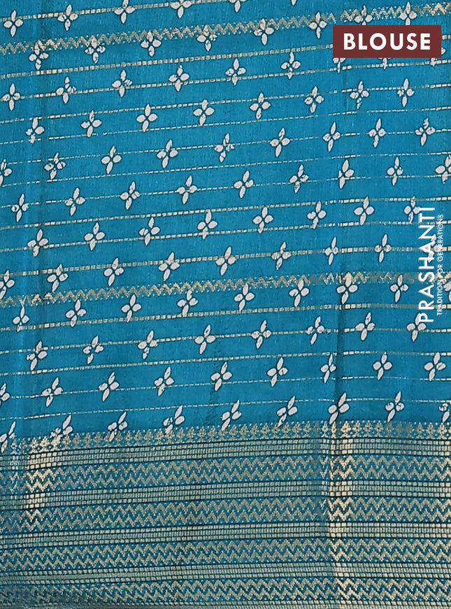 Semi dola saree teal blue with allover zari stripes & prints and zari woven border