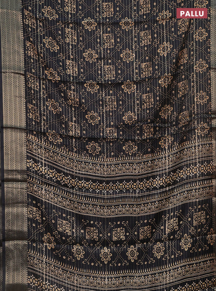 Semi dola saree black with allover zari stripes & prints and zari woven border