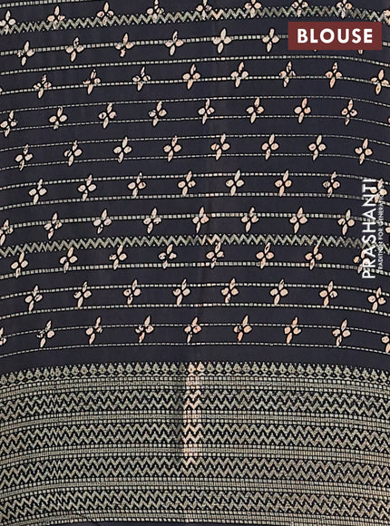 Semi dola saree black with allover zari stripes & prints and zari woven border