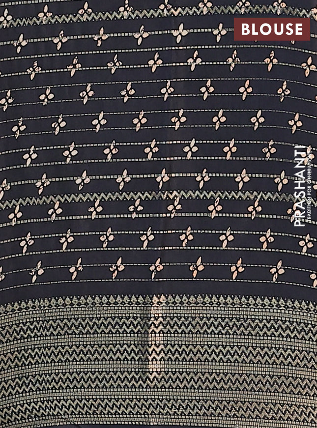 Semi dola saree black with allover zari stripes & prints and zari woven border