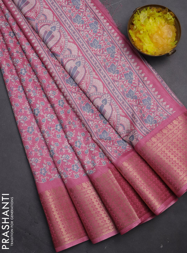 Semi dola saree peach pink with allover prints and zari woven border