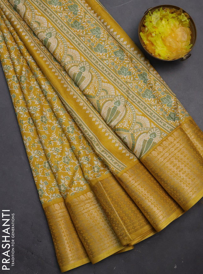 Semi dola saree mustard yellow with allover prints and zari woven border