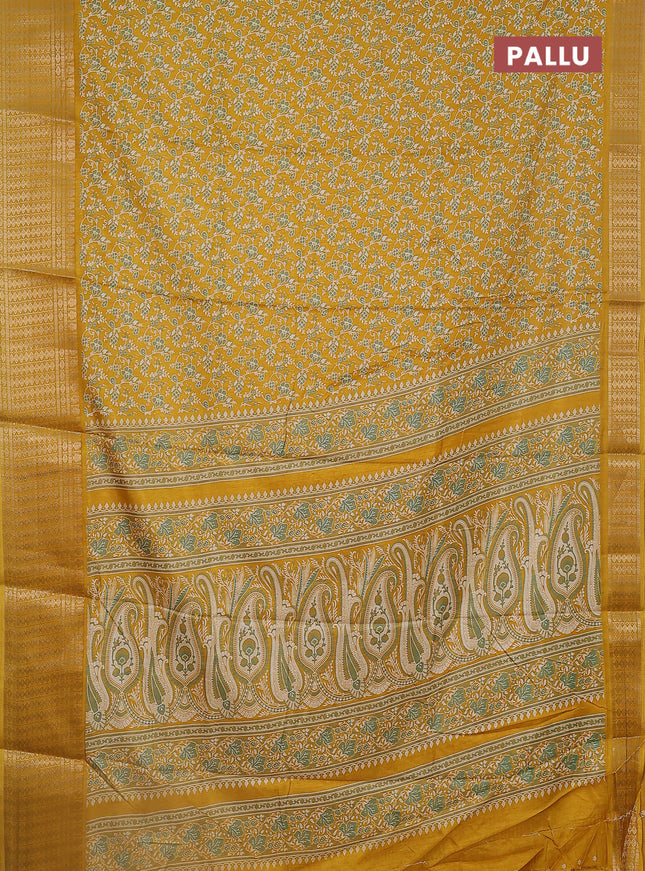 Semi dola saree mustard yellow with allover prints and zari woven border
