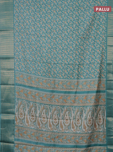 Semi dola saree teal blue shade with allover prints and zari woven border