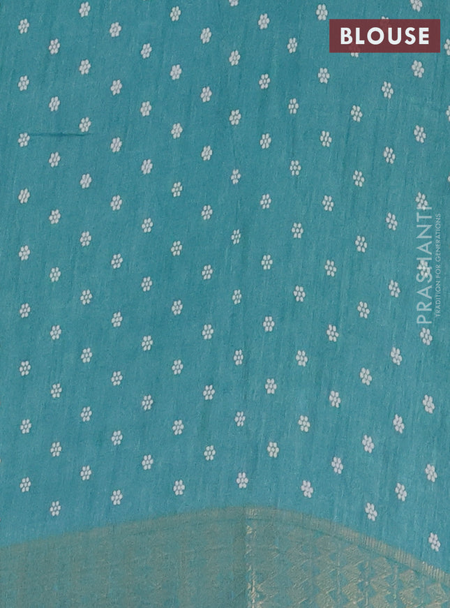 Semi dola saree teal blue shade with allover prints and zari woven border