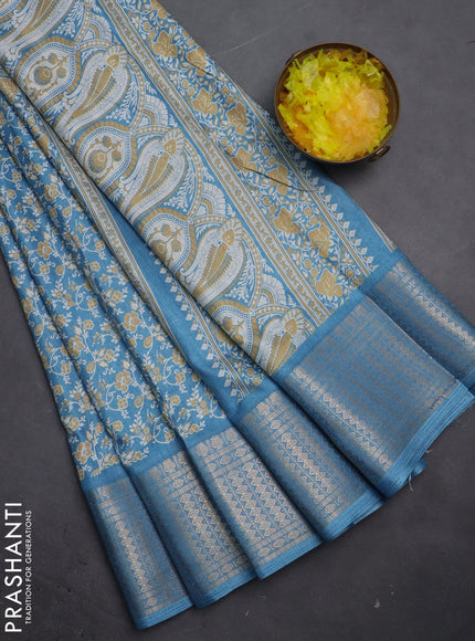 Semi dola saree pastel blue with allover prints and zari woven border