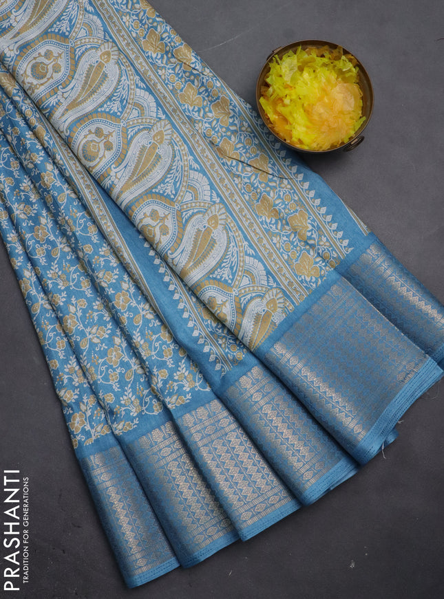 Semi dola saree pastel blue with allover prints and zari woven border