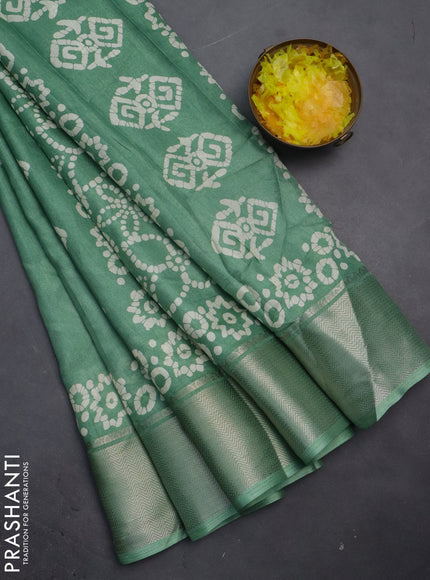 Semi dola saree pastel green with batik butta prints and zari woven border