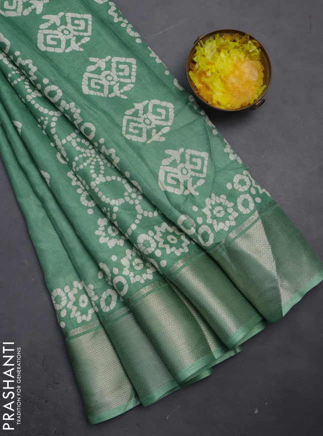 Semi dola saree pastel green with batik butta prints and zari woven border