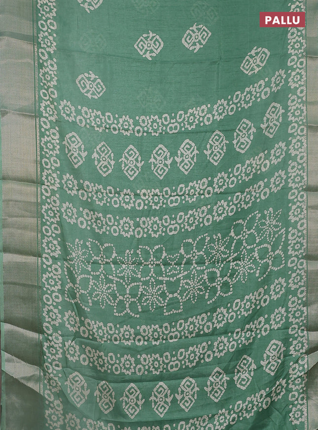 Semi dola saree pastel green with batik butta prints and zari woven border