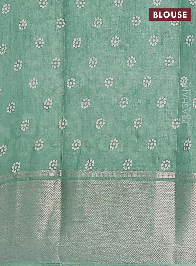 Semi dola saree pastel green with batik butta prints and zari woven border