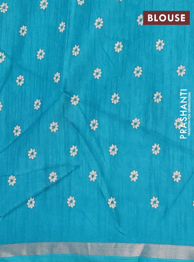 Semi dola saree teal blue with allover batik prints and zari woven border