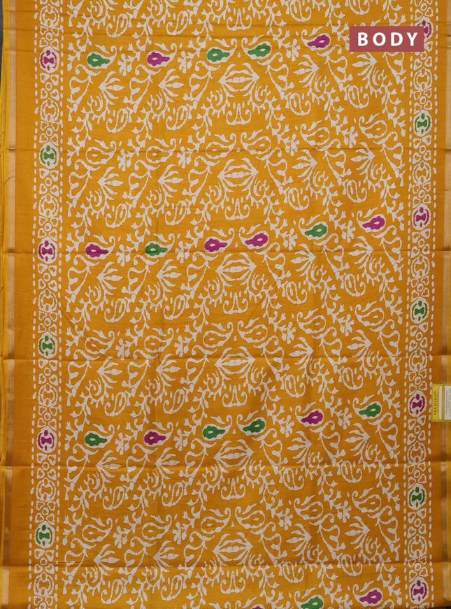 Semi dola saree mustard yellow with allover batik prints and zari woven border