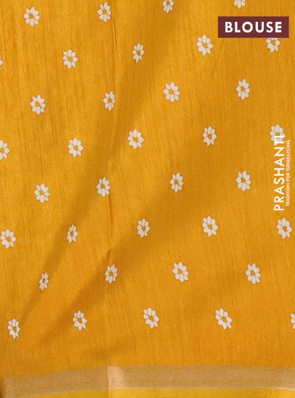 Semi dola saree mustard yellow with allover batik prints and zari woven border