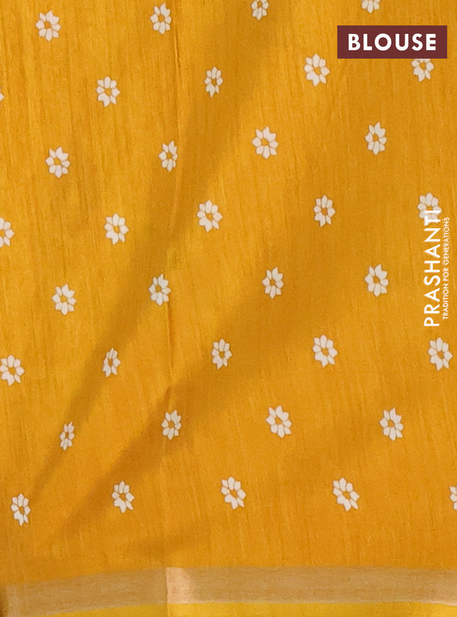 Semi dola saree mustard yellow with allover batik prints and zari woven border