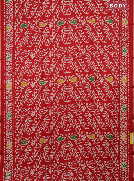 Semi dola saree red with allover batik prints and zari woven border
