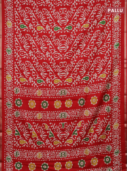 Semi dola saree red with allover batik prints and zari woven border