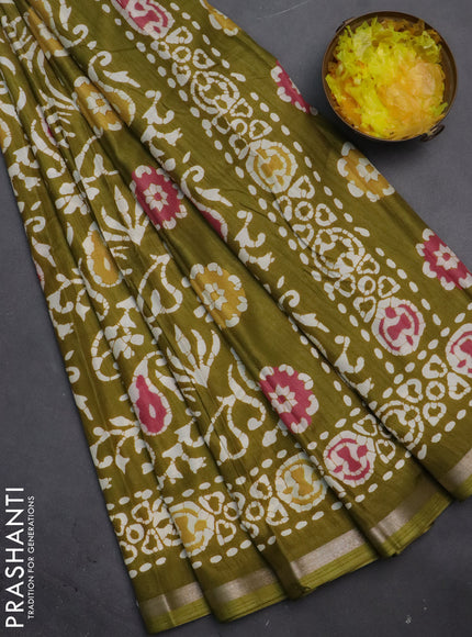 Semi dola saree mehendi green with allover batik prints and zari woven border