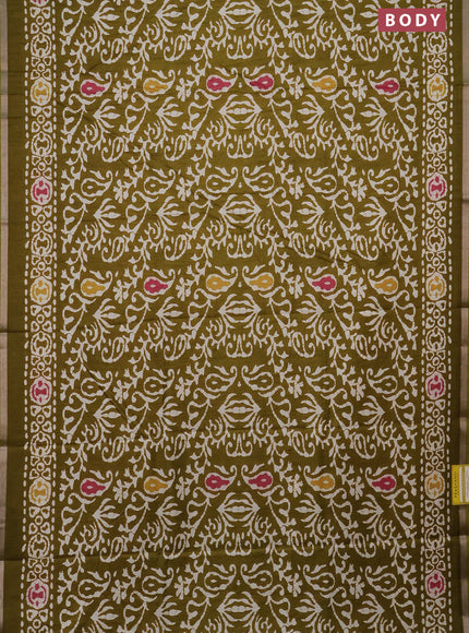 Semi dola saree mehendi green with allover batik prints and zari woven border