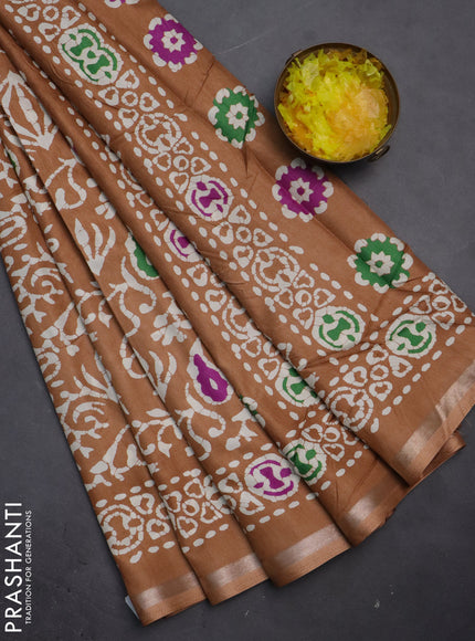 Semi dola saree pastel brown with allover batik prints and zari woven border