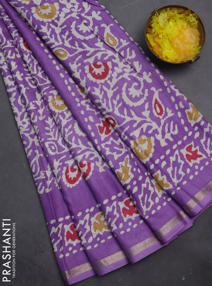 Semi dola saree lavender with allover batik prints and zari woven border