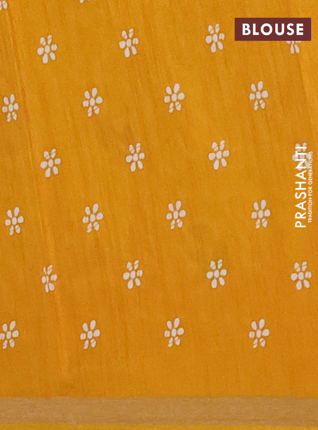 Semi dola saree mustard yellow with allover batik prints and zari woven border