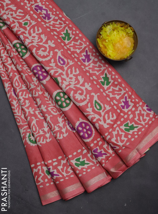 Semi dola saree peach shade with allover batik prints and zari woven border