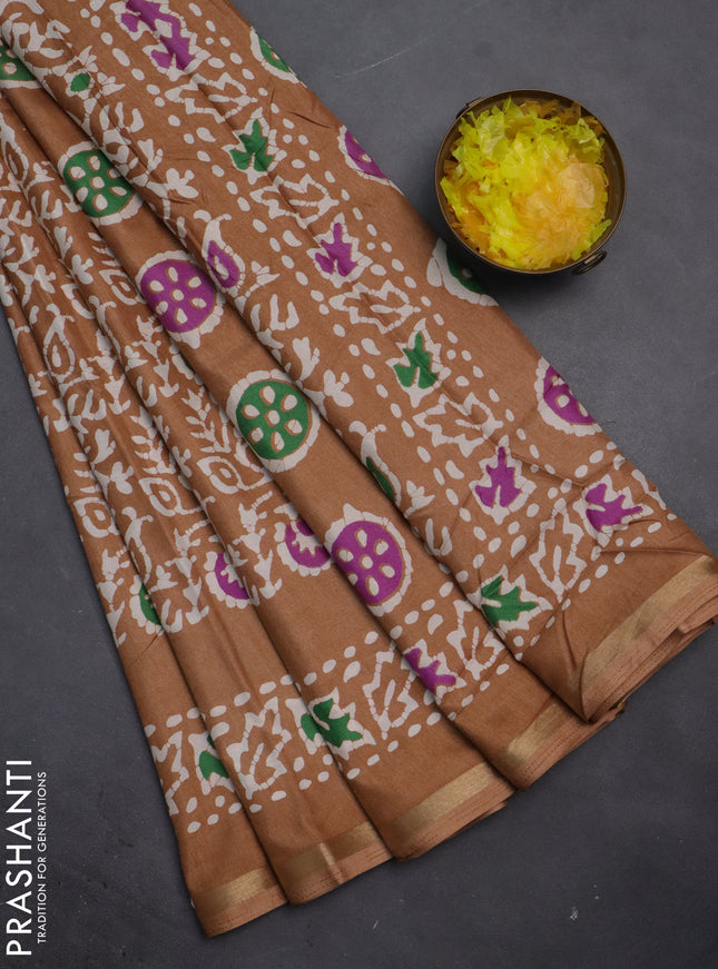 Semi dola saree pastel brown with allover batik prints and zari woven border