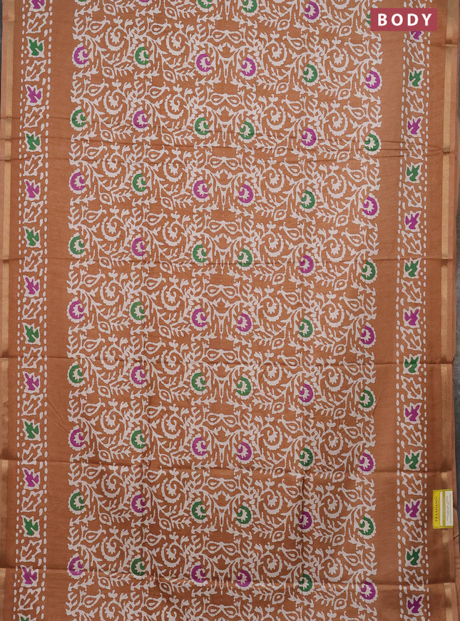 Semi dola saree pastel brown with allover batik prints and zari woven border