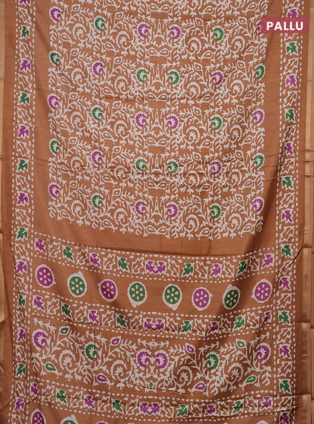 Semi dola saree pastel brown with allover batik prints and zari woven border