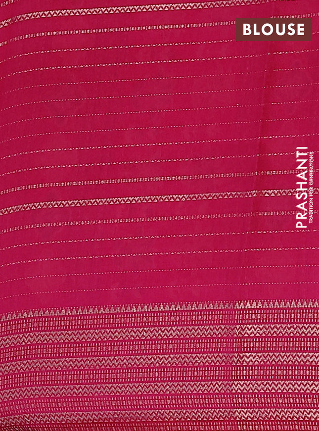 Semi dola saree dark green and pink with allover zari weaves & floral prints and zari woven border