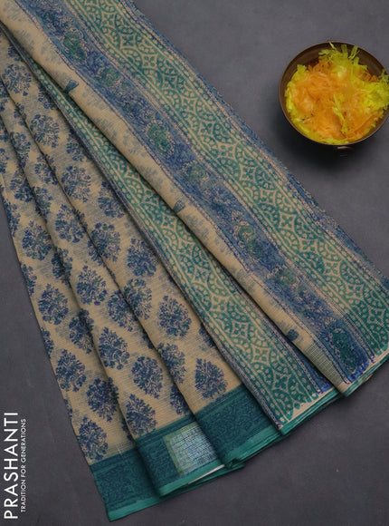 Kota doria saree beige and teal green shade with allover block prints and printed border