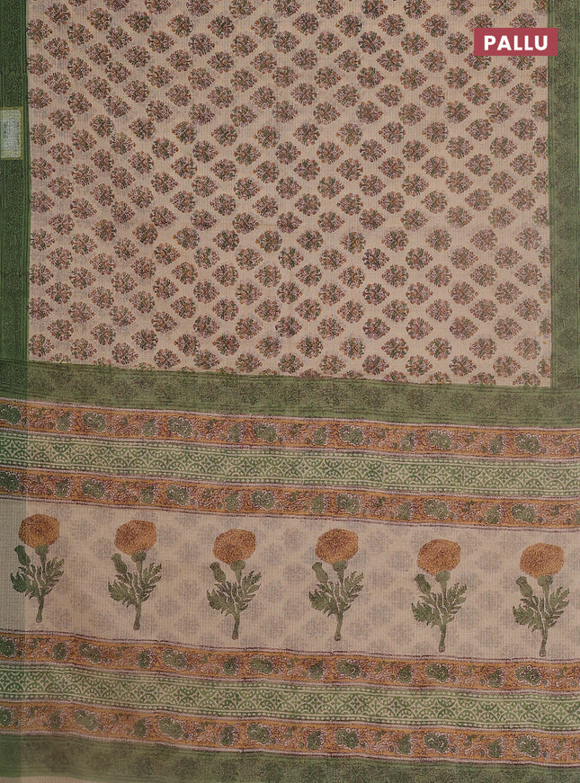 Kota doria saree beige and green with allover block prints and printed border