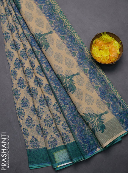 Kota doria saree beige and teal green shade with allover block prints and printed border