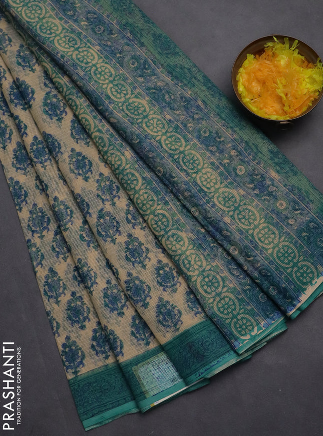 Kota doria saree beige and teal blue with allover block prints and printed border