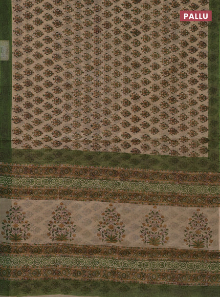 Kota doria saree beige and green with allover block prints and printed border