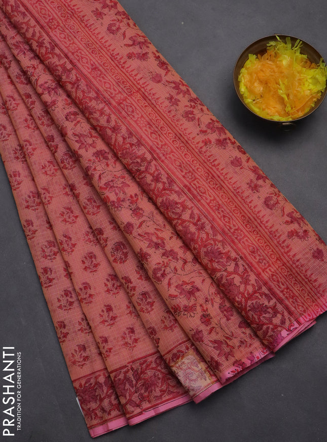 Kota doria saree dual shade of peach pink and pink with allover block prints and printed border