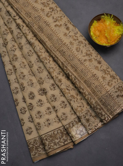 Kota doria saree beige and dark sandal with allover block prints and printed border