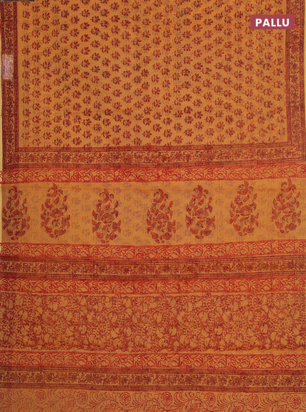 Kota doria saree orange and red with allover block prints and printed border
