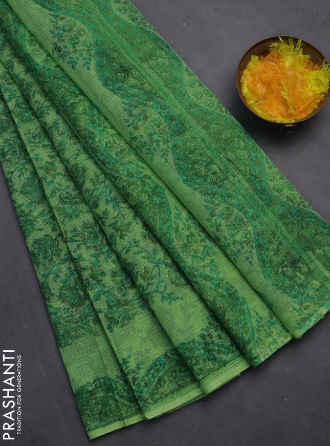 Kota doria saree light green with allover block prints and printed border