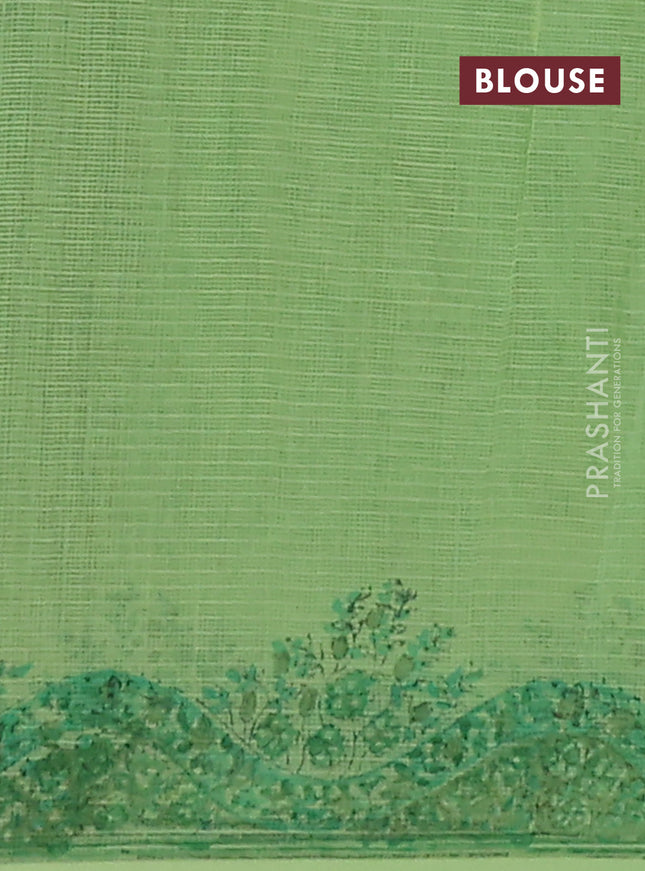 Kota doria saree light green with allover block prints and printed border