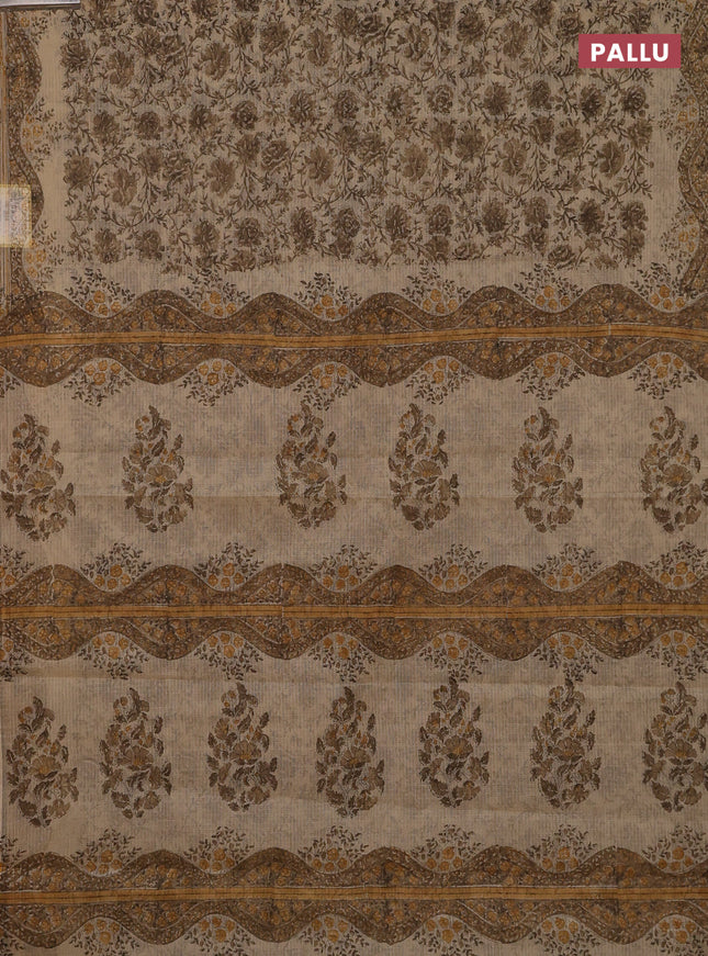 Kota doria saree beige and dark sandal with allover block prints and printed border