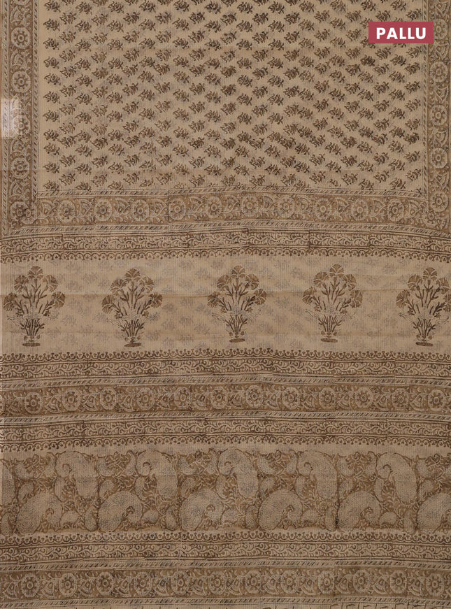 Kota doria saree beige and dark sandal with allover block prints and printed border