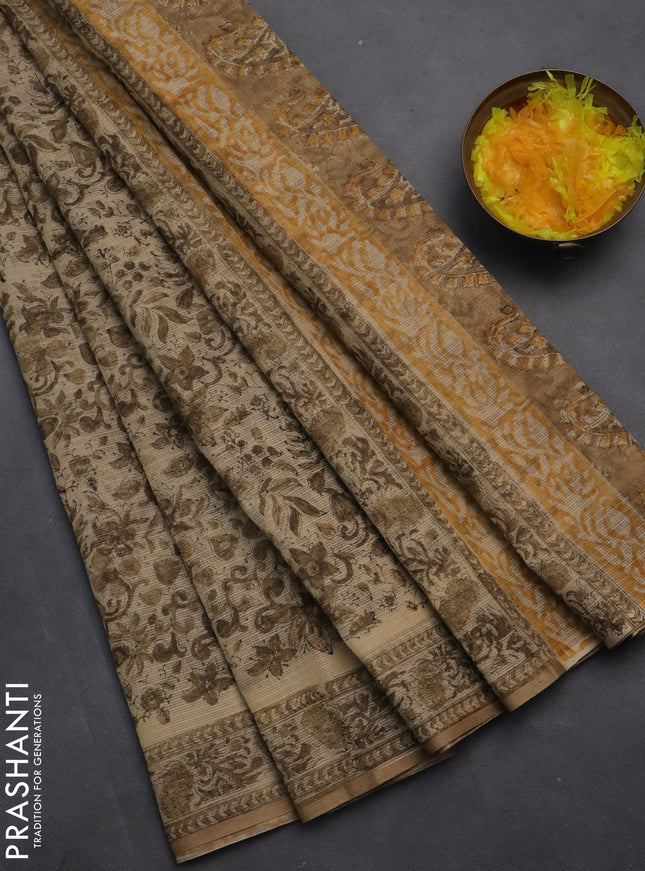 Kota doria saree beige and sandal with allover block prints and printed border