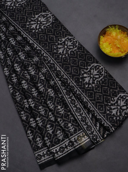 Kota doria saree black and off white with allover dabu prints and printed border