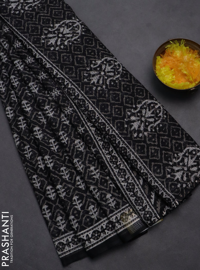 Kota doria saree black and off white with allover dabu prints and printed border