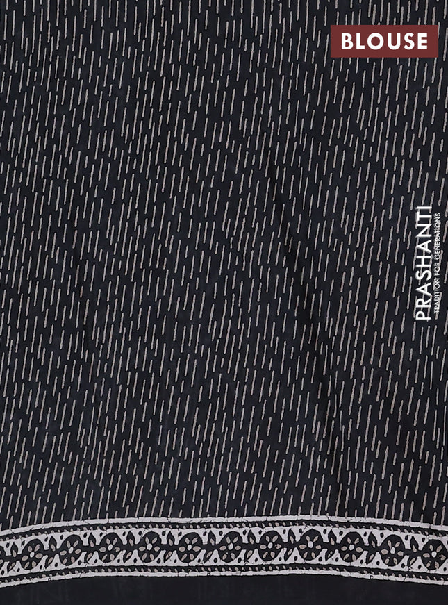 Kota doria saree black and off white with allover dabu prints and printed border