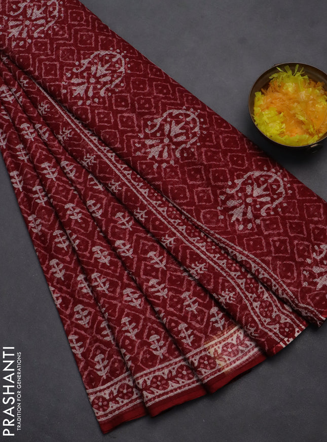 Kota doria saree maroon and off white with allover dabu prints and printed border
