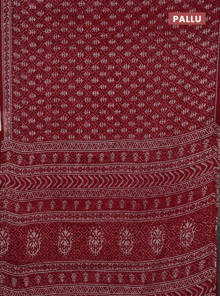 Kota doria saree maroon and off white with allover dabu prints and printed border