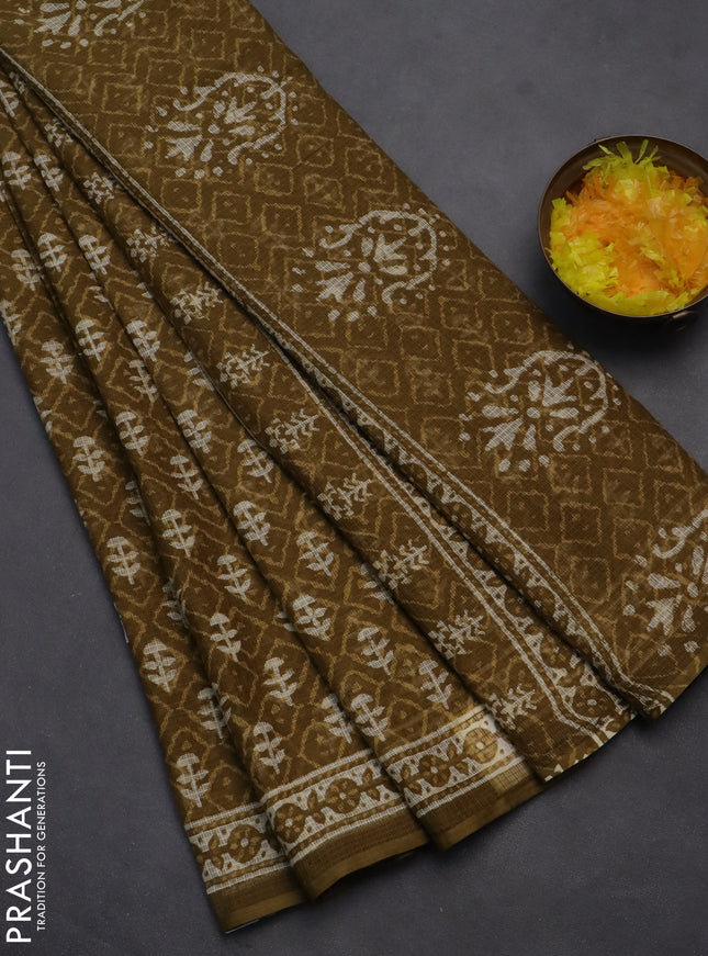Kota doria saree mehendi green with allover dabu prints and printed border